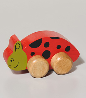 MARIENKÄFER auf Rädern Acaciaholz, 13x5,5xH6cm